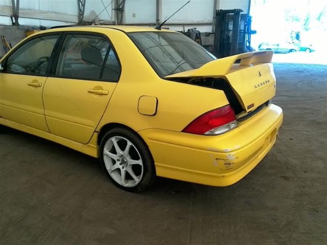 2002 mitsubishi lancer oz rally parts